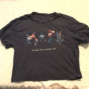 A short sleeve tee, says “beautiful life beautiful soul”